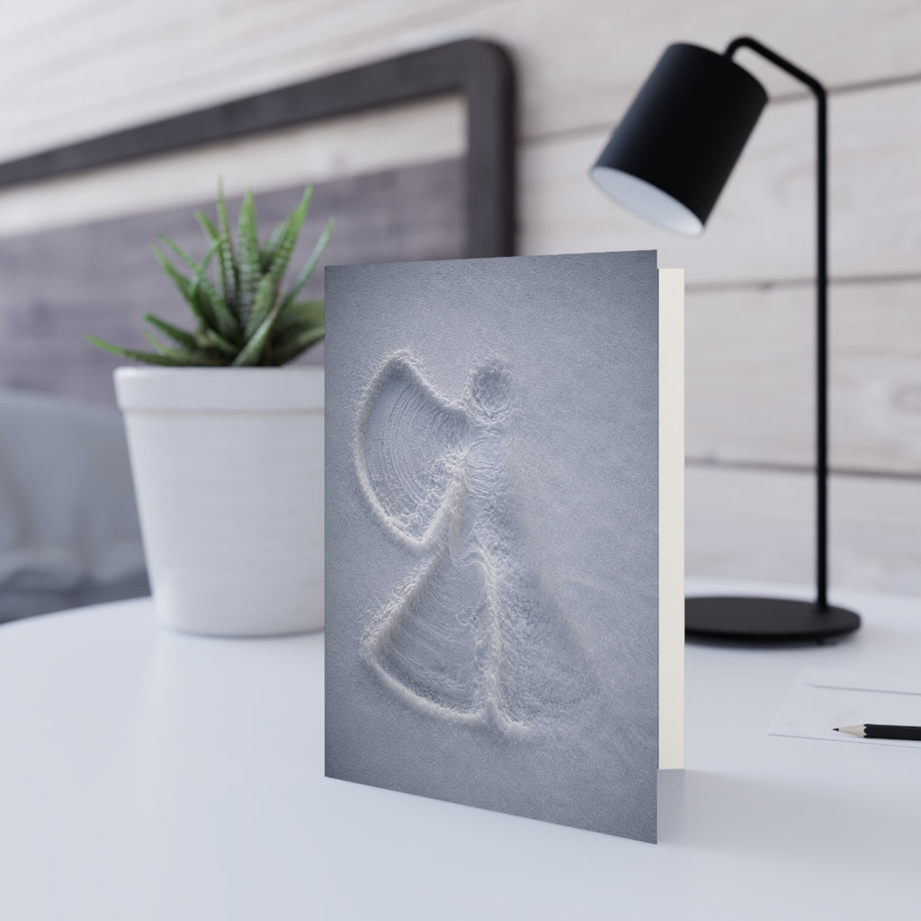 Fading / Someone laughed here. Someone stretched out their arms, made a snow angel, stood up... and walked away. Now winter is quietly reclaiming the moment. / Holiday Greeting Card