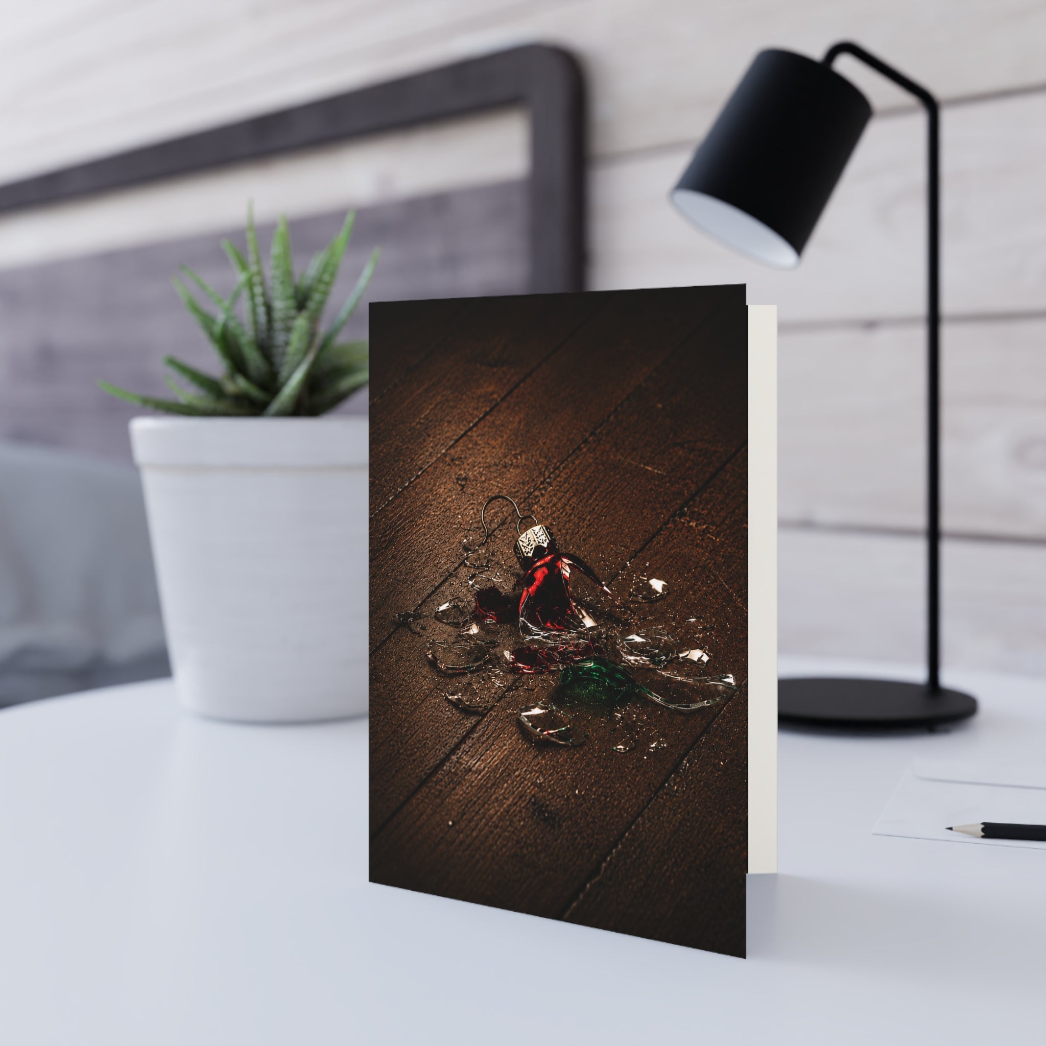 Irreplaceable/Everyone freezes for the same sound. Glass. Then comes the quiet. Someone says, "It's okay." Someone else says, "That was Grandma's." The cleanup takes a minute. The story lasts for years. / Holiday Greeting Card