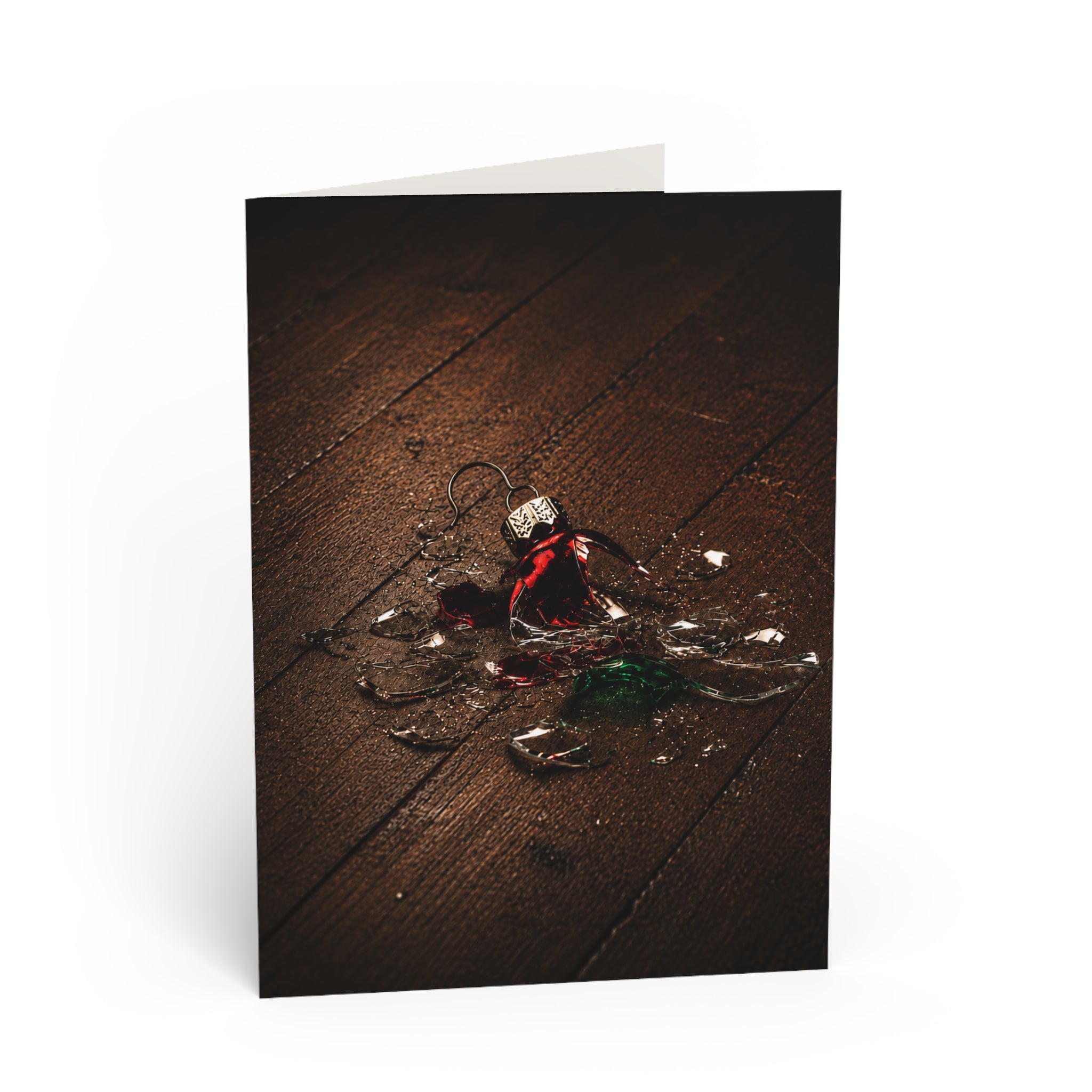 Irreplaceable/Everyone freezes for the same sound. Glass. Then comes the quiet. Someone says, "It's okay." Someone else says, "That was Grandma's." The cleanup takes a minute. The story lasts for years. / Holiday Greeting Card